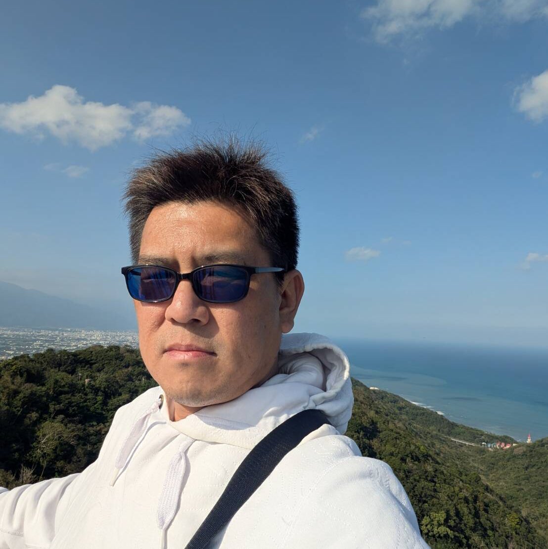 哲維的大頭照